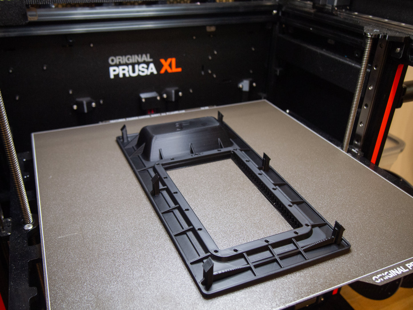 Nissan R31 Skyline manual shifter surround in progress on a 3D printer, showcasing precision manufacturing and high-quality material construction.